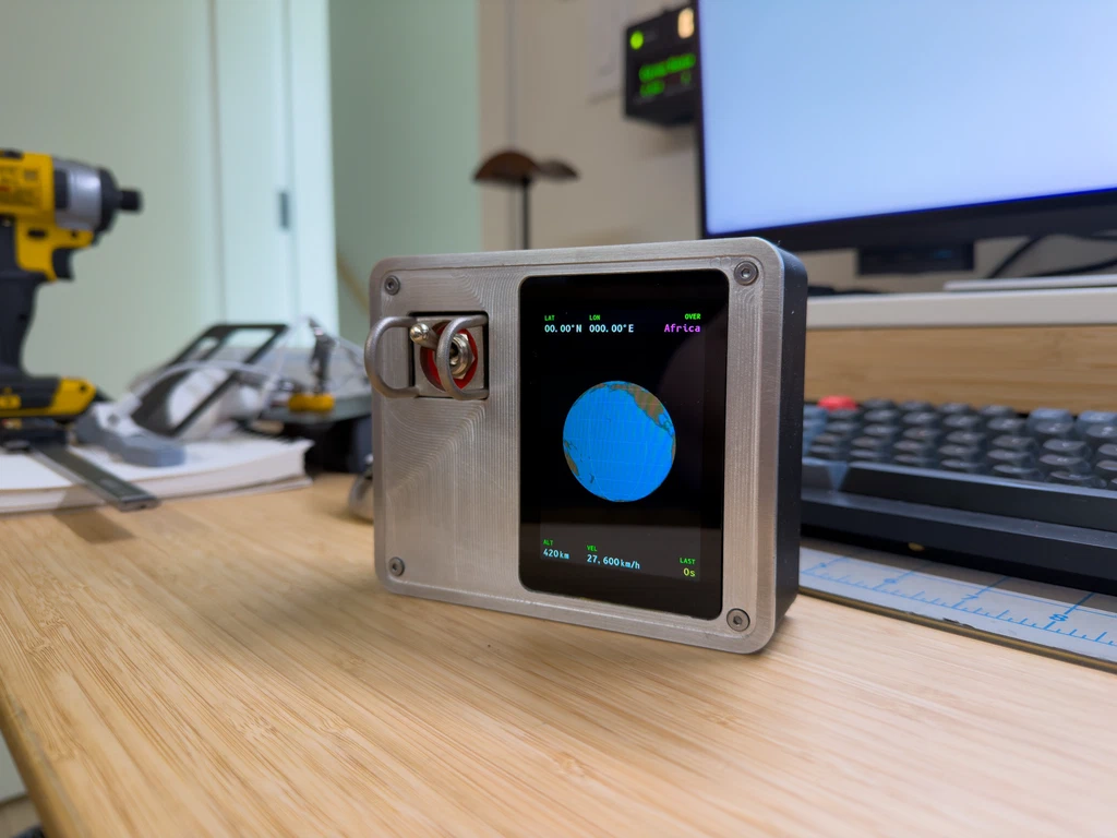 Aluminum faceplate mounted to housing